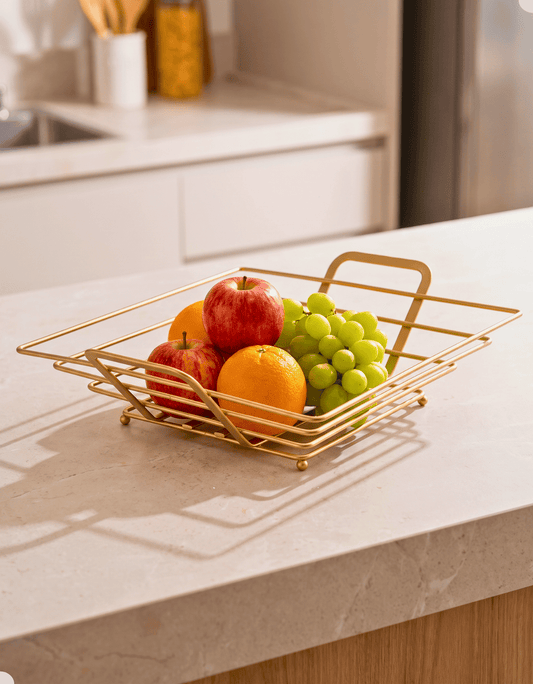 Fruteira Arthi Gold Dourada de mesa com frutas sobre bancada de cozinhaProduct Image